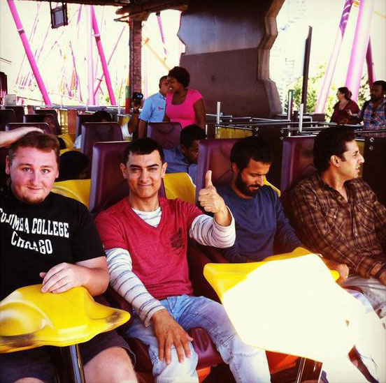 Aamir Khan with Abhishek Bachchan on a roller coaster ride