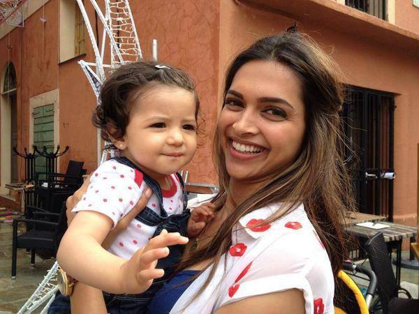 Deepika Padukone with a little fan on the sets of Tamasha