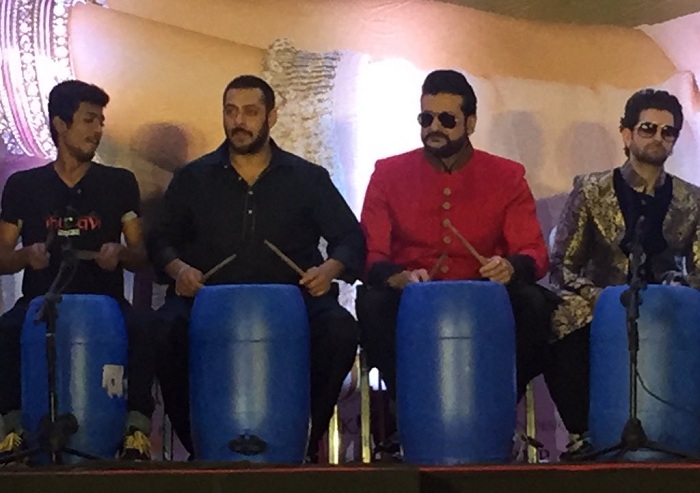Salman Khan playing the drums with the kids