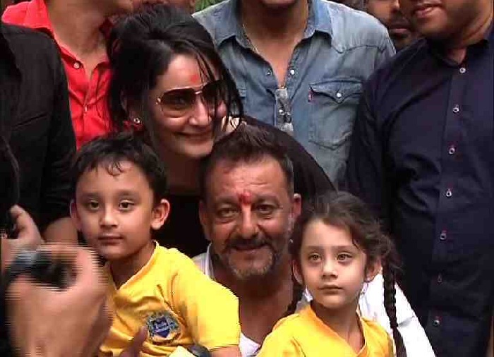 Sanjay Dutt addresses the media with his family