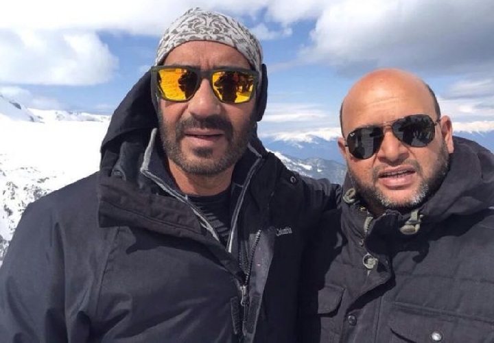 Ajay Devgn with a crew member of Shivaay at Balkan mountains