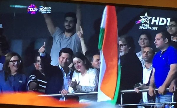 Bachchan proudly waves the National Flag