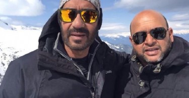 Ajay Devgn with a crew member of Shivaay at Balkan mountains