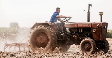 Salman Khan driving a tractor in the farms on Punjab